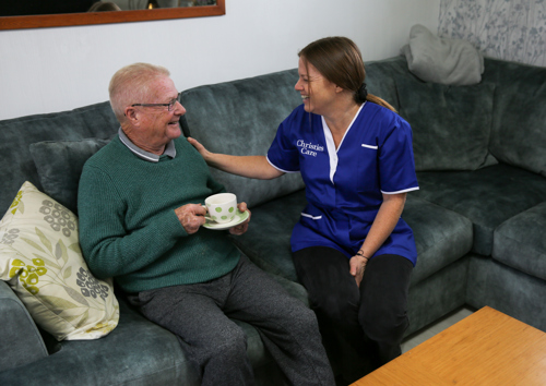 Hourly Carer with Client having Coffee - CHRISTIES BROCHURE PAGE & SOCIALS.jpg